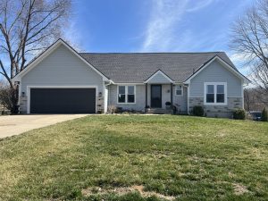 1970s ranch home kansas city siding replacement stone accents window replacement